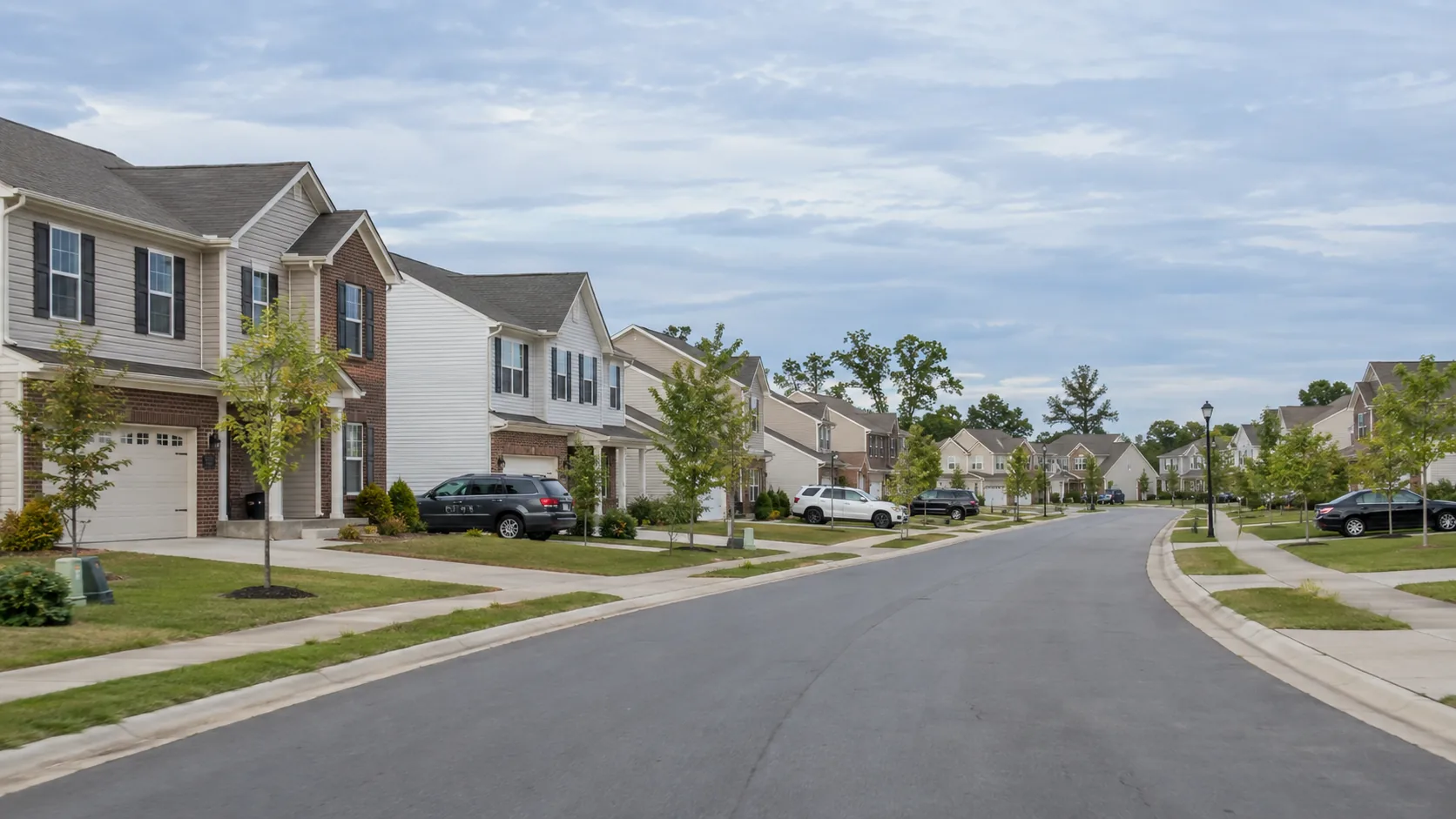 A residential subdivision with rows of similar detached homes